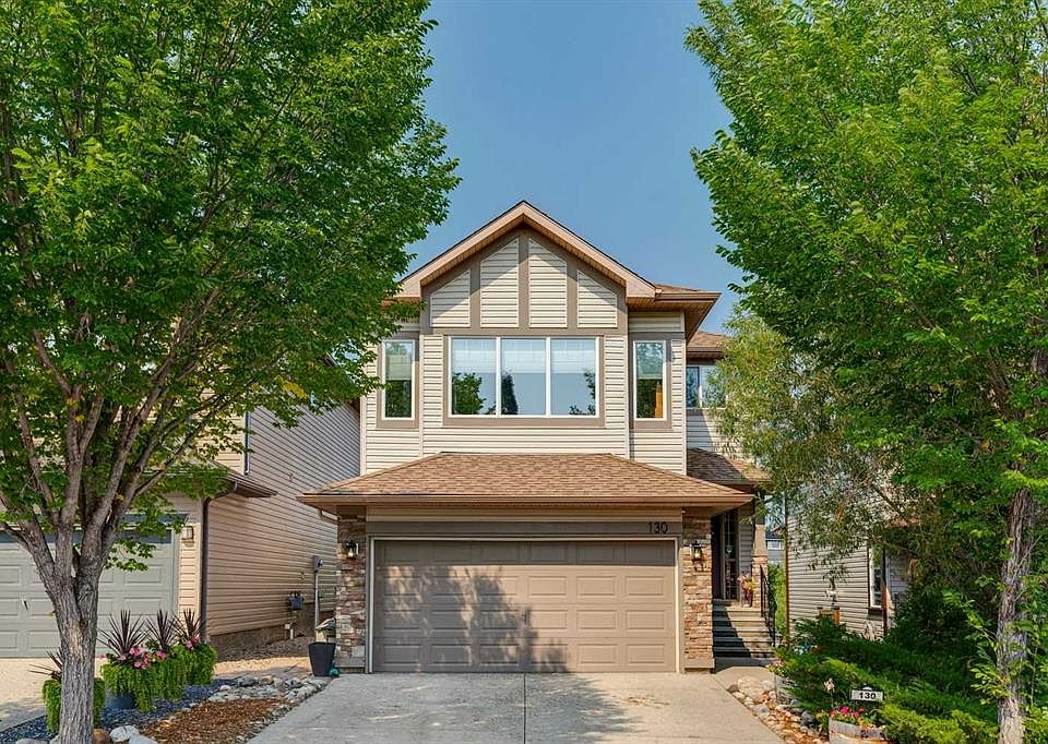 1st image of 130 S Tuscany Valley Grn NW