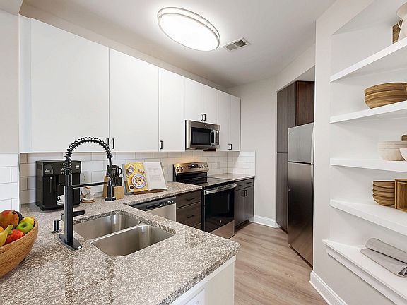 Newly Renovated Kitchen with Stainless Steel Appliances