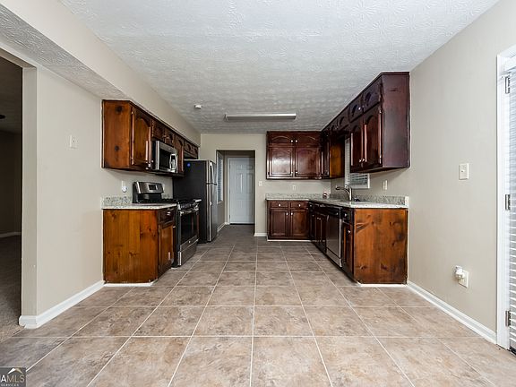 4th image of 4610 Browns Mill Lake Ct
