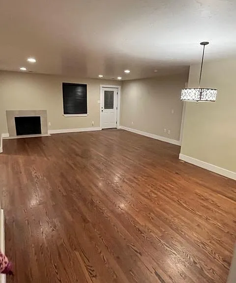 View from the kitchen with the dinning area on the right and the front door straight ahead.