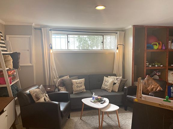 View of the basement level living room/family room (not included in the list price please contact directly for pricing and availability).