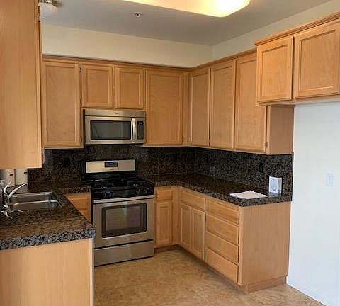 Stainless steel refrigerator included but not in photo