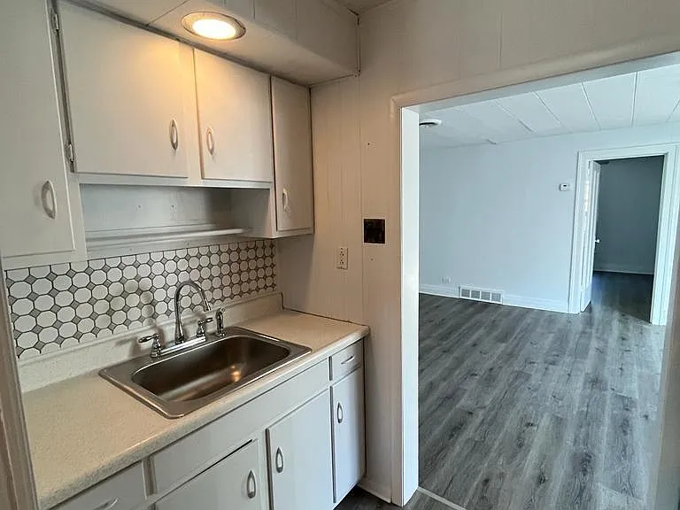 Renovated kitchen sink+ backsplash