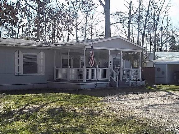 COVERED FRONT PORCH FOR BEAUTIFUL LAKE LIVINGSTON SUNSETS