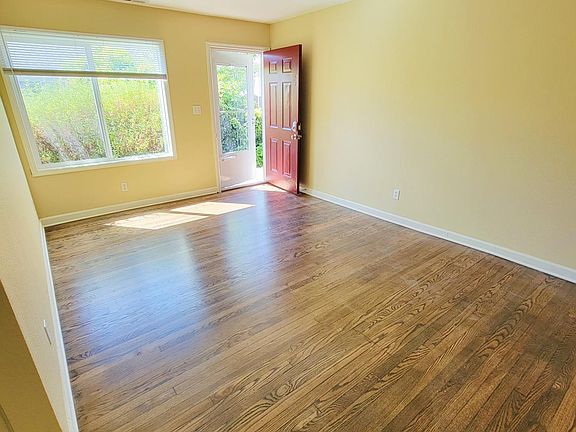 Beautiful hardwood floors and large front window