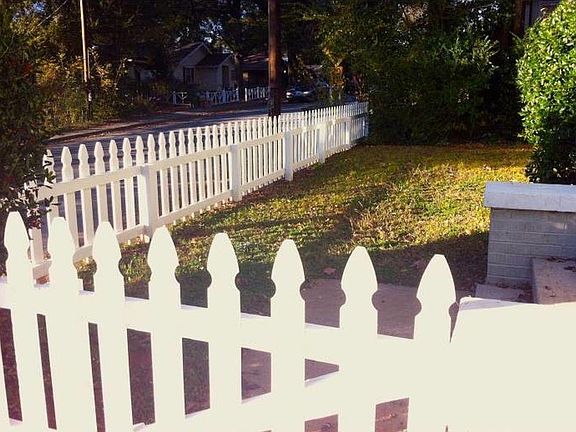 Fenced in front yard.