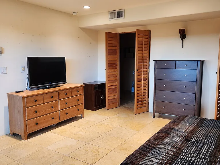 The doors to the master bathroom from the patio doors.