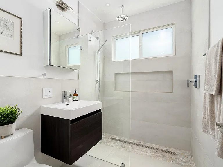 Newly renovated bathroom w/ waterfall shower