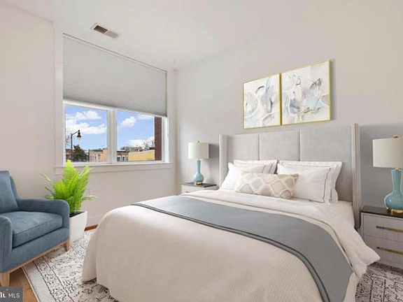 The large bedroom is as light filled as the main living area, but also has the benefit of high-end blackout shades.