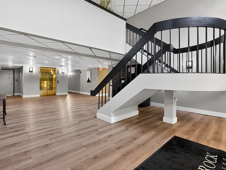 Step into modern elegance at Eagle Rock Apartments at Swampscott. This inviting lobby features stylish finishes and a grand staircase, setting the tone for a vibrant community. Don't miss out on your chance to elevate your lifestyleschedule a tour today!