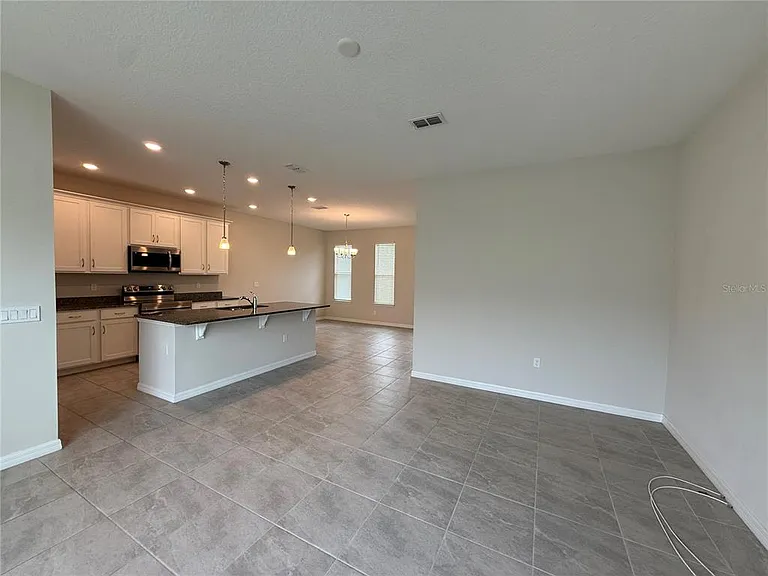 5072 Avalon Park Blvd — Photo 3