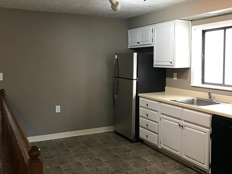 Kitchen. Brand new stainless steel refrigerator.