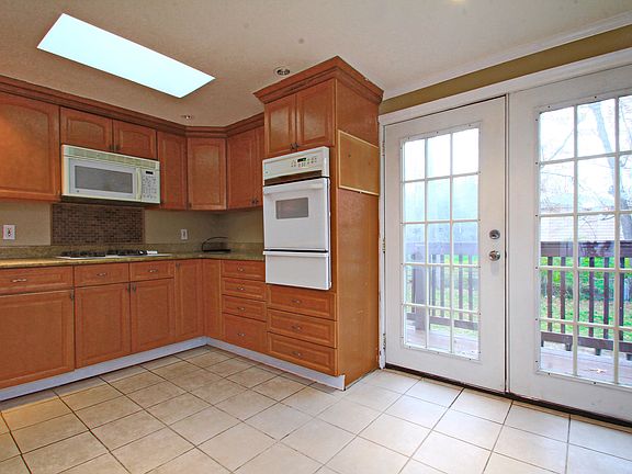 Kitchen w/ Doors to Yard