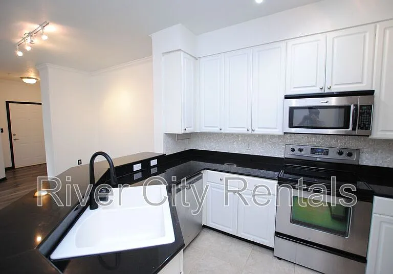 8539 Gate Pkwy W #1736 — Photo 30