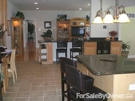 VIEW OF KITCHEN / VIEW 2-STORY FAMILY RM