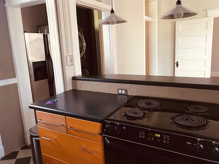 View from Kitchen into Dining Room and Laundry/Pantry/Refrigerator