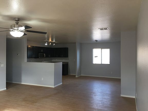 Bright open kitchen with hard wood floors, newly two-tone pa