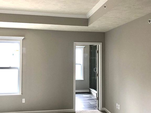 Master bedroom with tray ceiling
