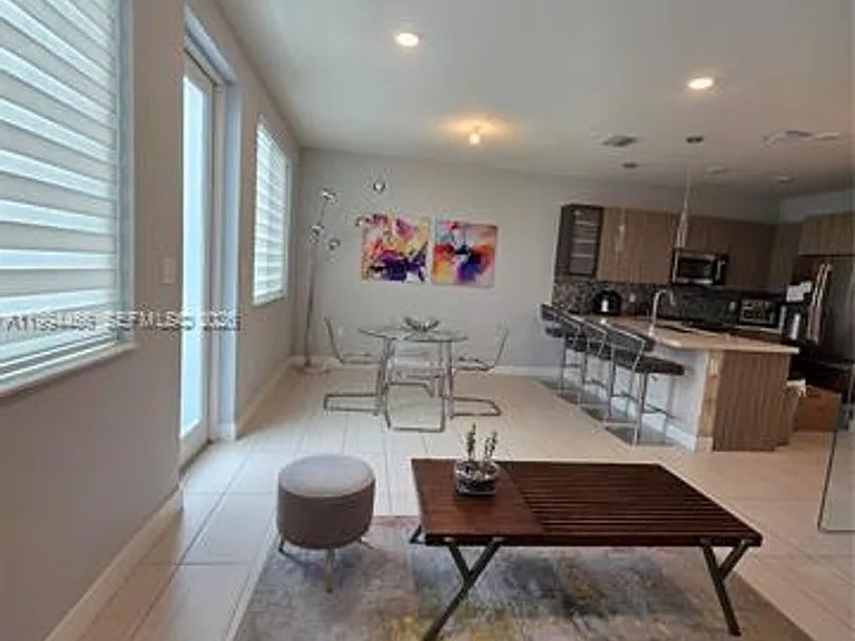 10222 NW 64th Way #302 — Photo 2