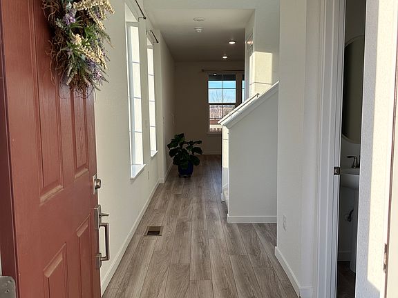 Entryway with half bath and coat closet