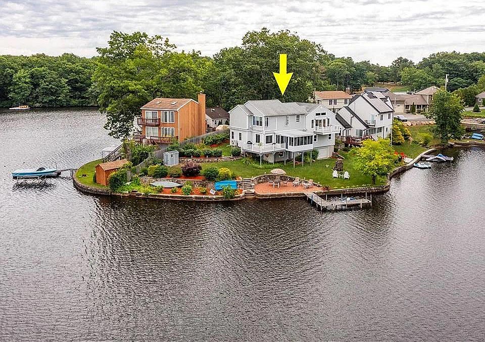 This home fronts on Slack Pond in Johnston