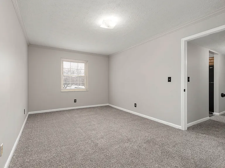 Large bedroom could fit a california king bed