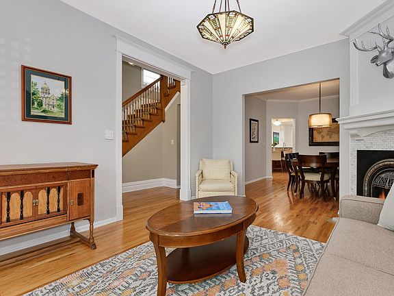 Living room opens to dining room and entry hallway
