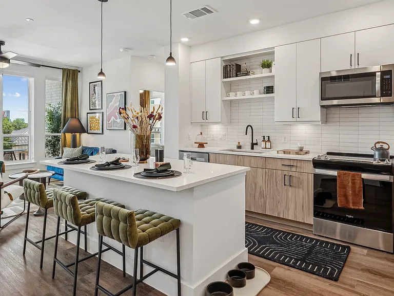 Kitchen with Stainless Steel Appliances and Breakfast Bar