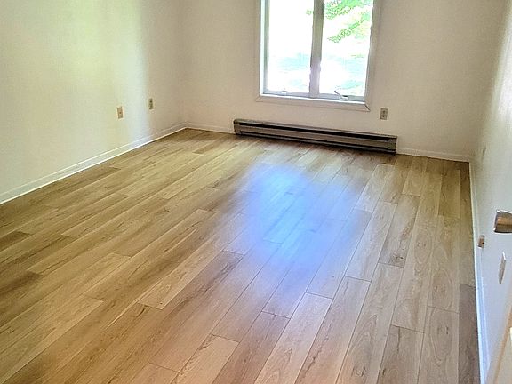 3 bedroom recently installed hardwoods style floors throughout