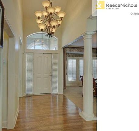 Foyer with hardwood floors!