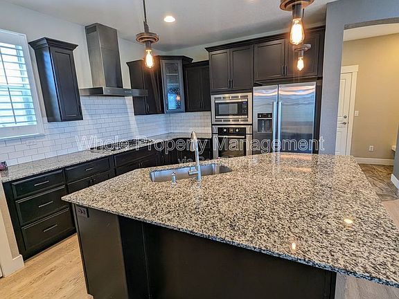 5th image of 8054 E 49th Dr