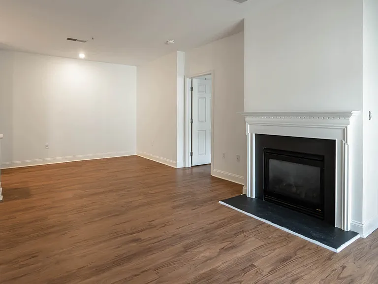 Living Room with Fireplace with Hard Surface Flooring