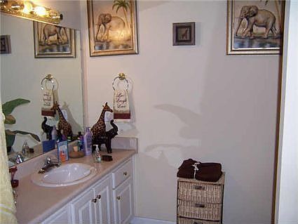 Master bath has his/her counters and garden tub and shower