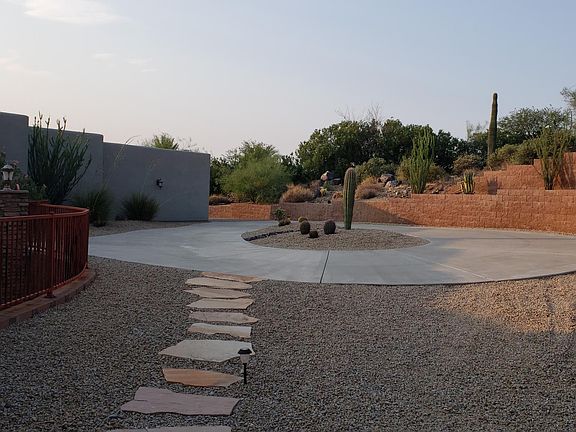 Larger circular Driveway
Flagstone path has been replaced by a Pavers path to the back patio