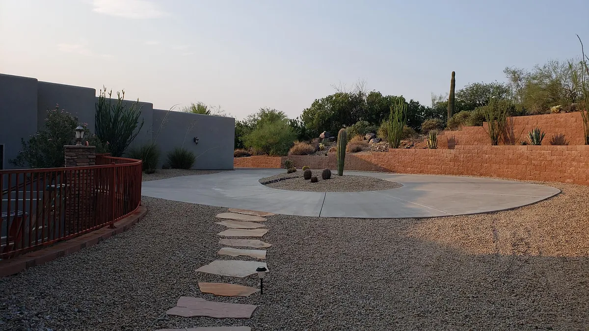 Larger circular Driveway
Flagstone path has been replaced by a Pavers path to the back patio - 40700 N 50th St