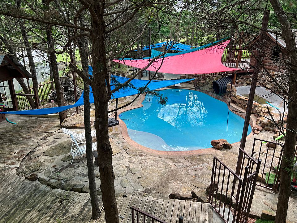 Go swimming in our large pool surrounded by beautiful cedar trees.