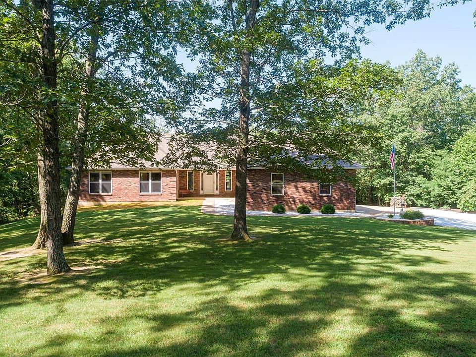 Beautiful custom ranch on 5+ acres - NO RESTRICTIONS - you can hunt on your own property!