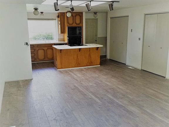 Large open living space and kitchen, from living area