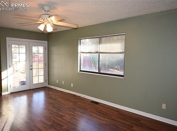 Family room, with french doors to back deck and yard