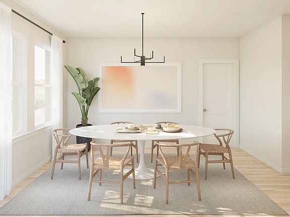 Dining area with pendant chandelier