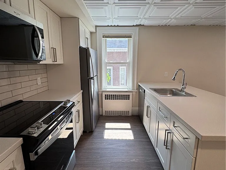 77 W Humboldt Pkwy #B — Photo 7