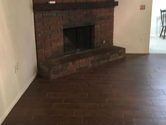 Corner Fire Place in Living Room - with Gas Logs. NOT wood burning !