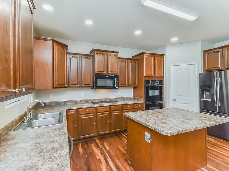7306 Running Deer Way — Photo 9