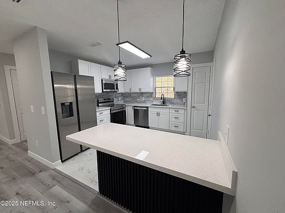 5th image of 6148 CATOMA Street