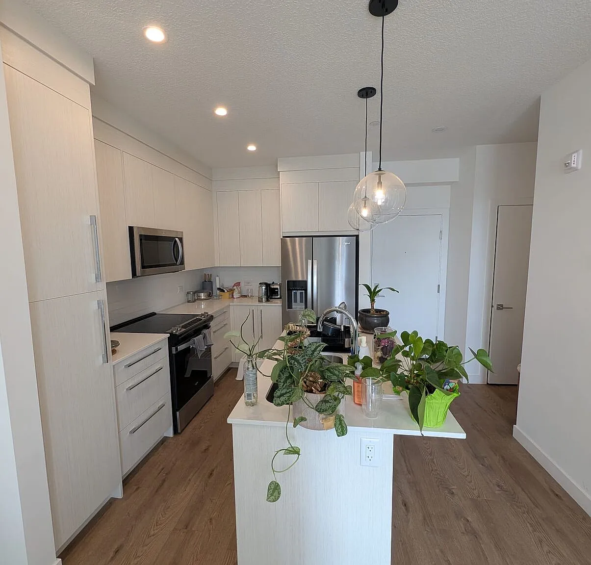Modern 2 Bedroom + Den Condo with Underground Parking in Skyview Ranch (IP059) — Photo 2