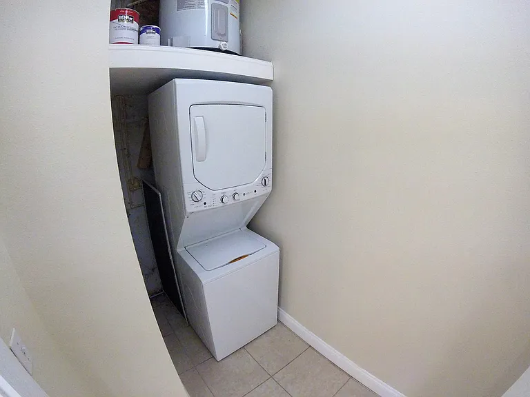 laundry room with private washer and dryer