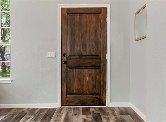 Gorgeous new front door.  Ties in nicely to the new Crestwood grey oak flooring.