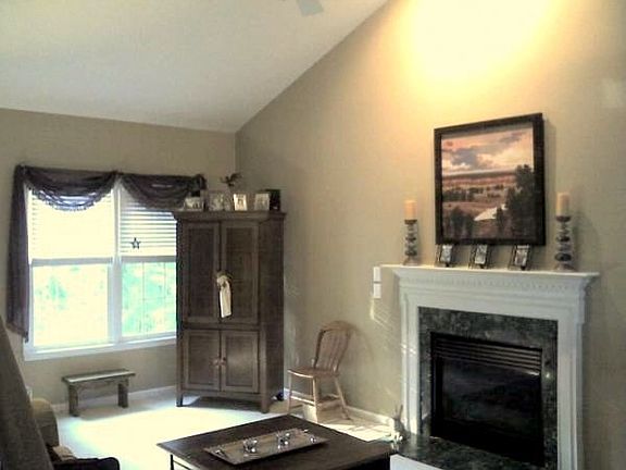 living room with cathedral ceiling