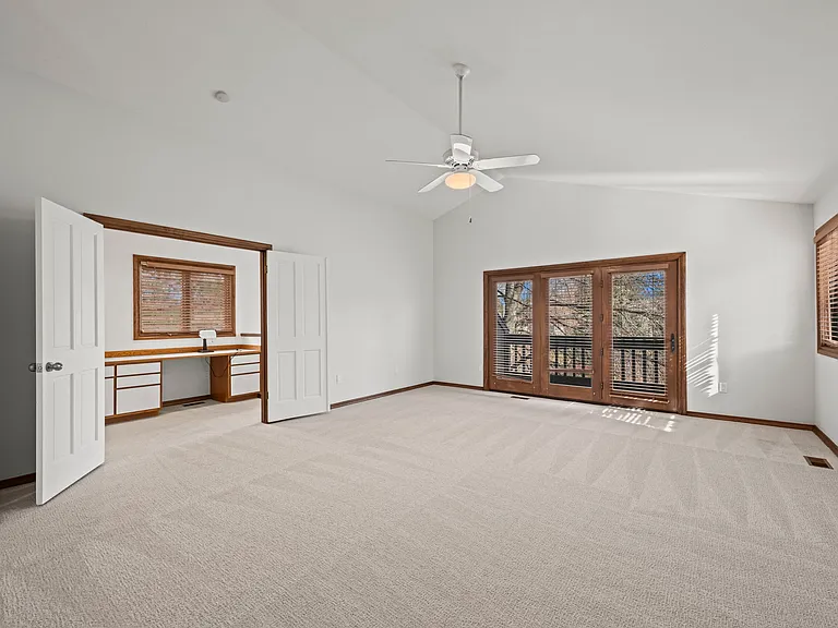 Master bedroom view to balcony and office area