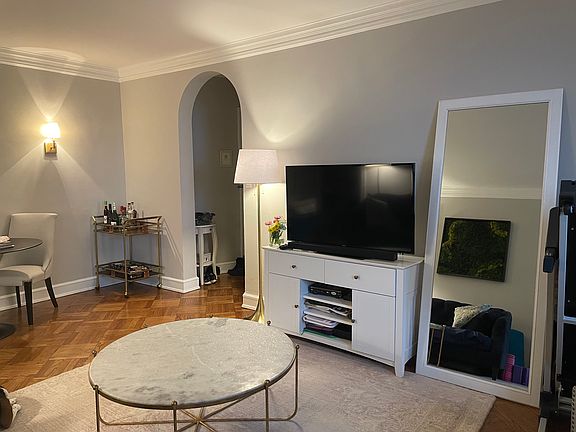 Living room facing entryway